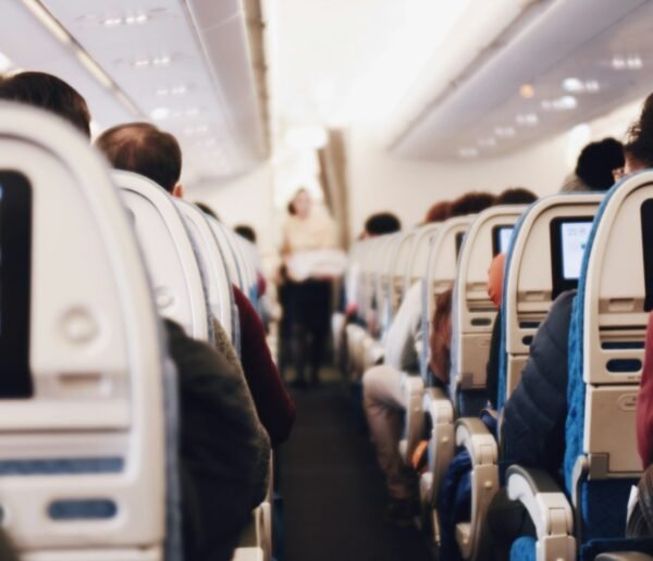 shallow focus photography of people inside of passenger plane